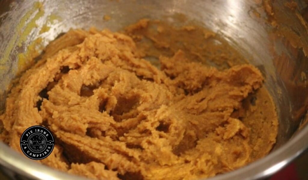 Mixed Ingredients of Easy Peanut Butter Cookies for Camping @ PieIronsAndCampfires.com